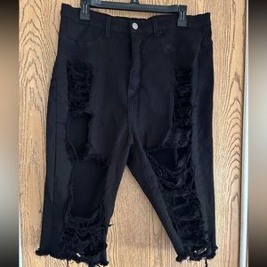 Fashion nova kady Bermuda shorts they are a size 2x I believe and are black